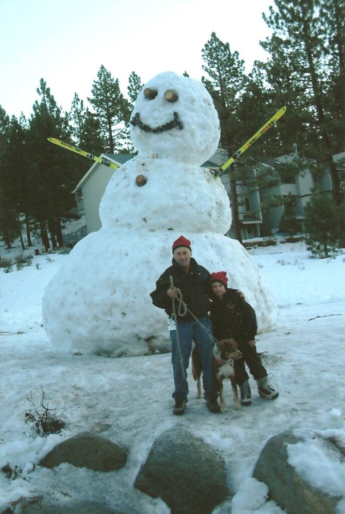 Jim Parkewr with son and snowman